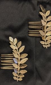 Set of gold leaf hair combs